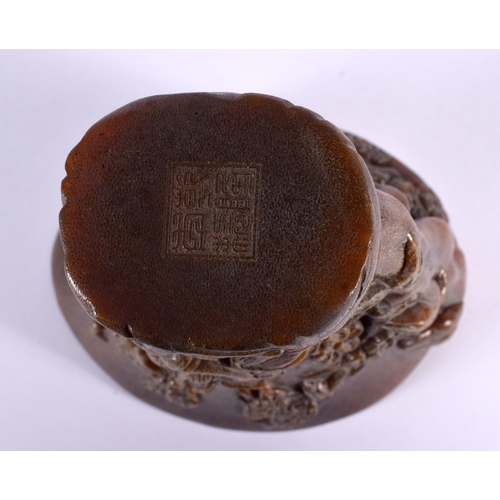 2002 - A CHINESE CARVED BUFFALO HORN TYPE LIBATION CUP 20th Century. 831 grams. 14 cm x 14 cm.