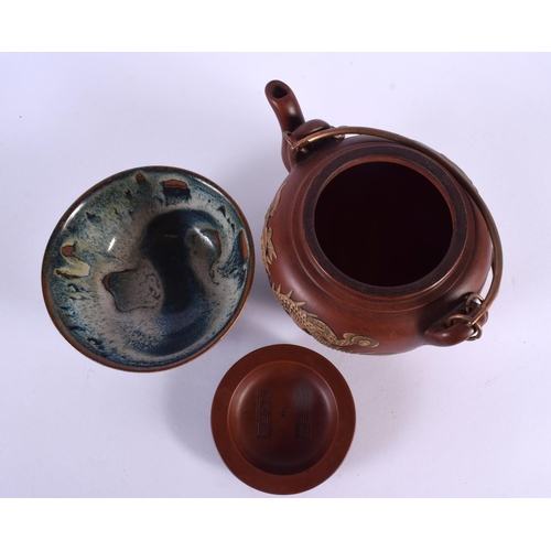 2009 - A CHINESE REPUBLICAN PERIOD YIXING POTTERY TEAPOT AND COVER together with a slip decorated bowl. Lar... 