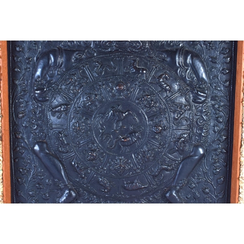 2012 - A 19TH CENTURY SINO TIBETAN COPPER ALLOY REPOUSSE PANEL depicting a Buddhistic beast amongst foliage... 