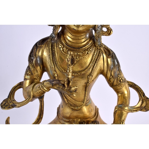 2027 - A LARGE EARLY 20TH CENTURY CHINESE TIBETAN BRONZE FIGURE OF AMITAYUS modelled holding aloft a stupa.... 