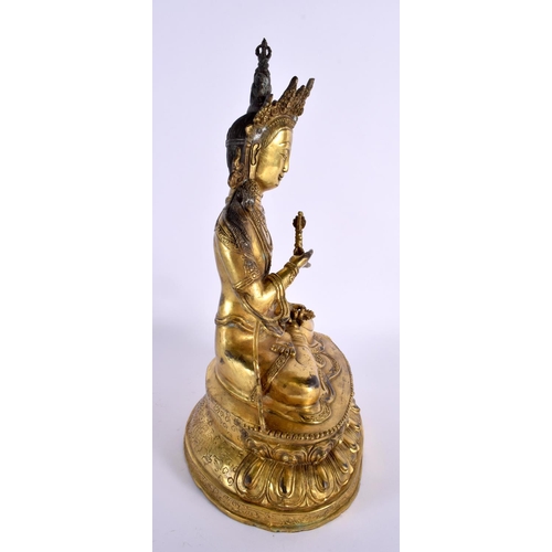 2027 - A LARGE EARLY 20TH CENTURY CHINESE TIBETAN BRONZE FIGURE OF AMITAYUS modelled holding aloft a stupa.... 