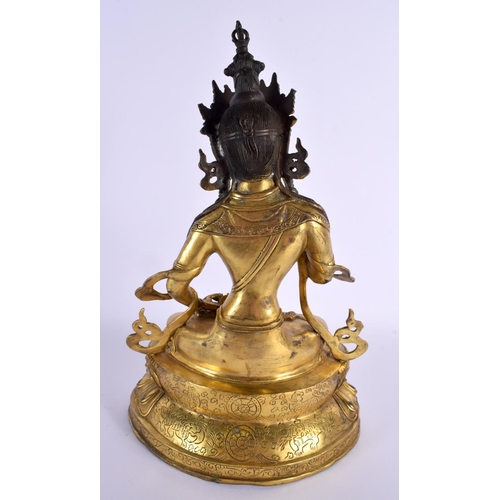 2027 - A LARGE EARLY 20TH CENTURY CHINESE TIBETAN BRONZE FIGURE OF AMITAYUS modelled holding aloft a stupa.... 