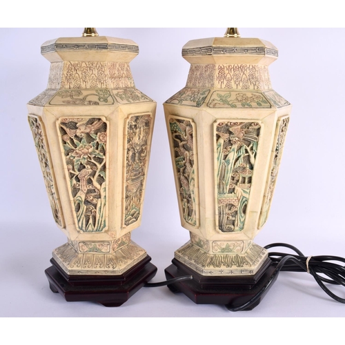 2040 - A PAIR OF CHINESE CARVED AND PAINTED BONE LAMPS 20th Century, decorated with birds and foliage. 60 c... 