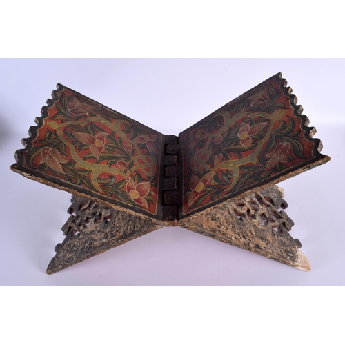 2043 - A 19TH CENTURY MIDDLE EASTERN ISLAMIC LACQUERED WOOD QURAN STAND painted with flowers. 40 cm x 34 cm... 