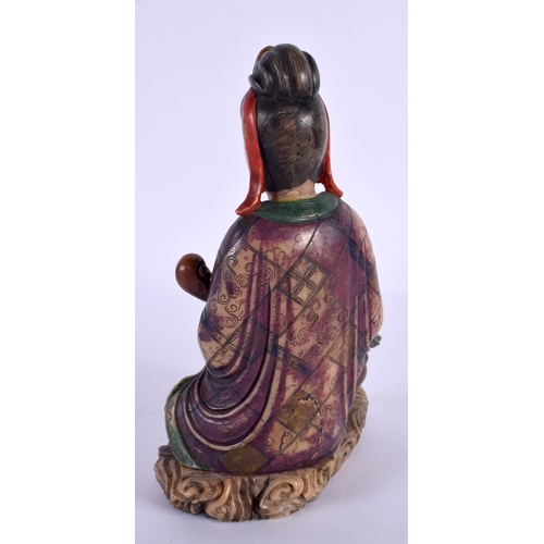 2048 - A LATE 19TH CENTURY CHINESE POLYCHROMED SOAPSTONE FIGURE OF GUANYIN Qing, modelled upon a rui sceptr... 