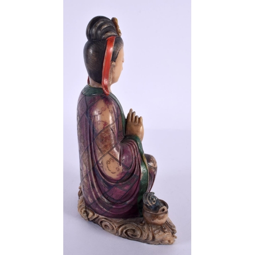 2048 - A LATE 19TH CENTURY CHINESE POLYCHROMED SOAPSTONE FIGURE OF GUANYIN Qing, modelled upon a rui sceptr... 