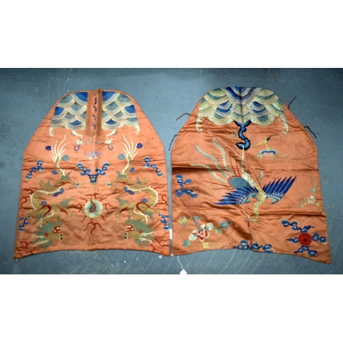 2054 - A PAIR OF 19TH CENTURY CHINESE ORANGE SILK EMBROIDERED DRAGON PANELS together with other similar sil... 