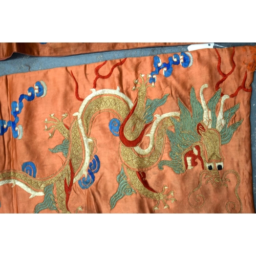 2054 - A PAIR OF 19TH CENTURY CHINESE ORANGE SILK EMBROIDERED DRAGON PANELS together with other similar sil... 