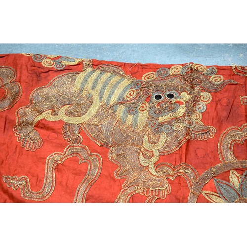 2054 - A PAIR OF 19TH CENTURY CHINESE ORANGE SILK EMBROIDERED DRAGON PANELS together with other similar sil... 