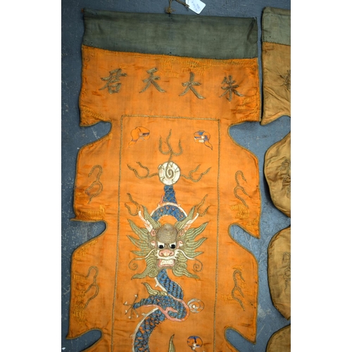 2054 - A PAIR OF 19TH CENTURY CHINESE ORANGE SILK EMBROIDERED DRAGON PANELS together with other similar sil... 