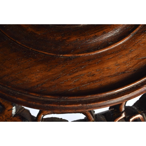 2056 - A 19TH CENTURY CHINESE CARVED HARDWOOD STAND Qing, together with another stand. Largest 18 cm wide. ... 