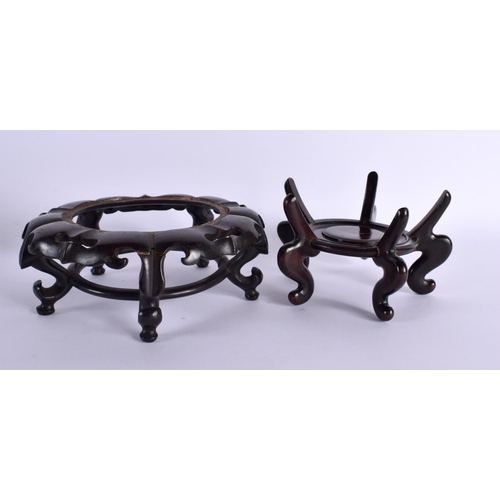 2063 - FOUR 19TH CENTURY CHINESE CARVED HARDWOOD DISPLAY STANDS Qing. Largest 16 cm x 14 cm. (4)