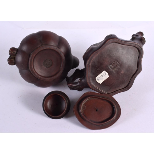 2075 - FIVE CHINESE YIXING POTTERY TEAPOT AND COVERS. Largest 15 cm wide. (5)