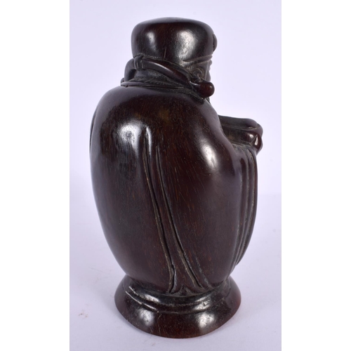 2088 - A CHINESE CARVED BUFFALO HORN TYPE FIGURE OF A SCHOLAR 20th Century. 661 grams. 15 cm x 8 cm.