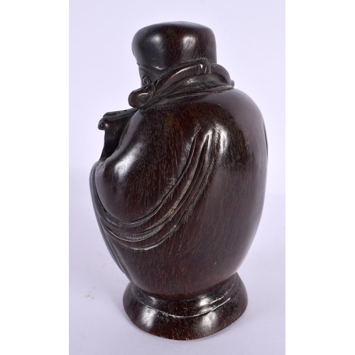 2088 - A CHINESE CARVED BUFFALO HORN TYPE FIGURE OF A SCHOLAR 20th Century. 661 grams. 15 cm x 8 cm.