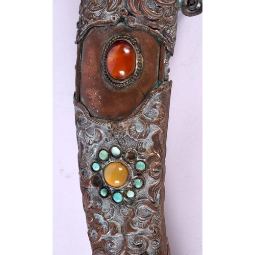 2090 - AN EARLY 20TH CENTURY CHINESE TIBETAN JEWELLED COPPER DAGGER decorated with foliage. 32 cm long.