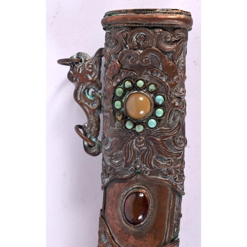 2090 - AN EARLY 20TH CENTURY CHINESE TIBETAN JEWELLED COPPER DAGGER decorated with foliage. 32 cm long.