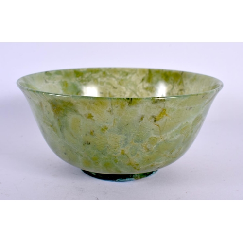 2091 - AN EARLY 20TH CENTURY CHINESE CARVED JADEITE BOWL Late Qing/Republic. 12.5 cm diameter.