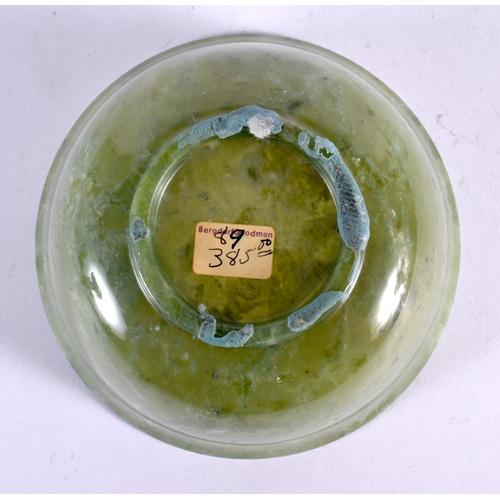 2091 - AN EARLY 20TH CENTURY CHINESE CARVED JADEITE BOWL Late Qing/Republic. 12.5 cm diameter.