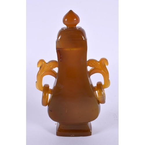 2105 - AN EARLY 20TH CENTURY CHINESE TWIN HANDLED AGATE VASE AND COVER Late Qing/Republic. 11 cm high.