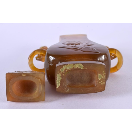 2105 - AN EARLY 20TH CENTURY CHINESE TWIN HANDLED AGATE VASE AND COVER Late Qing/Republic. 11 cm high.