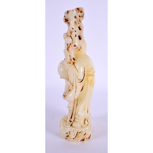 2106 - A CHINESE CARVED WHITE JADE TYPE FIGURE OF SAGE 20th Century. 19 cm high.