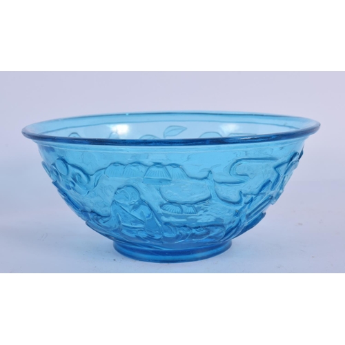 2107 - A 19TH CENTURY CHINESE PEKING BLUE GLASS BOWL Qing, decorated with figures. 16 cm diameter.