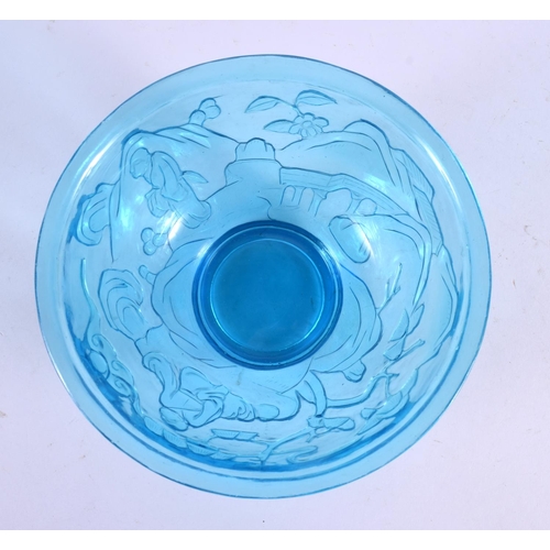 2107 - A 19TH CENTURY CHINESE PEKING BLUE GLASS BOWL Qing, decorated with figures. 16 cm diameter.