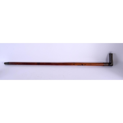 2112 - A 19TH CENTURY CHINESE MIDDLE EASTERN CARVED RHINOCEROS HORN WALKING CANE. 90 cm long.