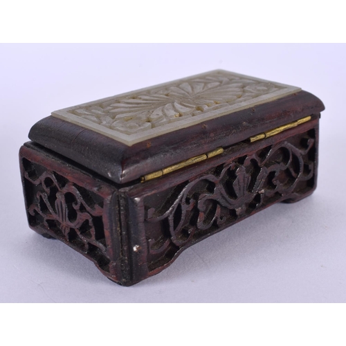 2120 - AN EARLY 20TH CENTURY CHINESE CARVED JADE AND HARDWOOD BOX Late Qing/Republic. 8 cm x 5 cm.