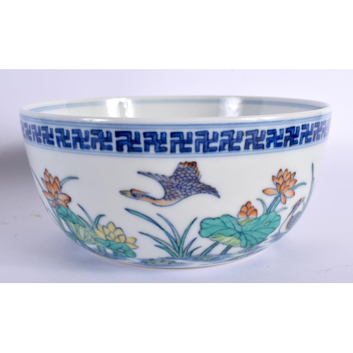 2121 - A CHINESE DOUCAI PORCELAIN SANDUAO DUCK BOWL 20th Century, together with a dish, bowl and stem cup. ... 