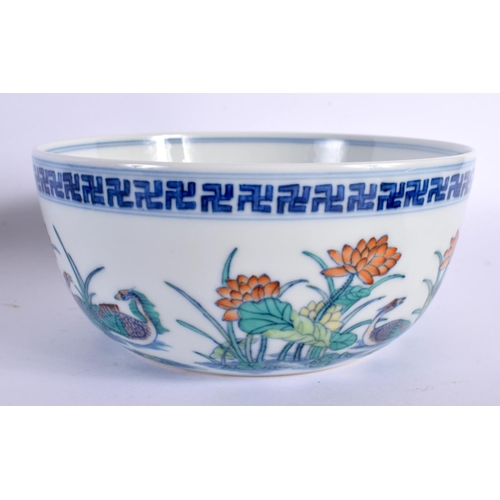 2121 - A CHINESE DOUCAI PORCELAIN SANDUAO DUCK BOWL 20th Century, together with a dish, bowl and stem cup. ... 