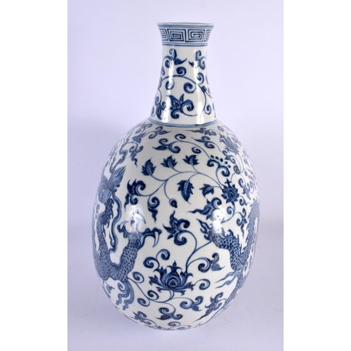 2125 - A LARGE CHINESE BLUE AND WHITE PORCELAIN PILGRIM FLASK 20th Century, painted with dragons. 45 cm x 3... 