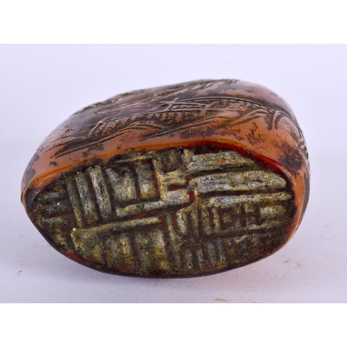 2138 - A CHINESE CARVED ORANGE HARDSTONE MOUNTAIN SEAL 20th Century. 11 cm x 7 cm.