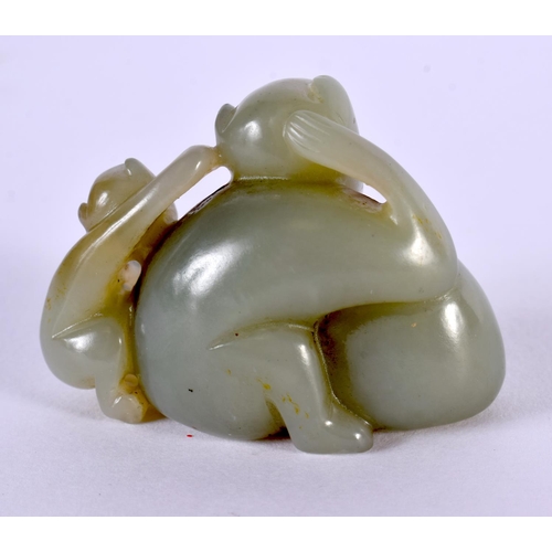 2158 - A CHINESE CARVED GREEN JADE FIGURE OF MONKEYS 20th Century. 5 cm x 3.5 cm.