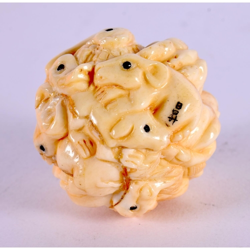 2163 - A JAPANESE CARVED BONE ZODIAC BALL. 4 cm diameter.