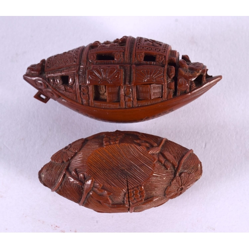 2200 - TWO 19TH CENTURY CHINESE CARVED BOAT NUTS Qing, one bearing inscription to base. 4 cm x 2 cm. (2)