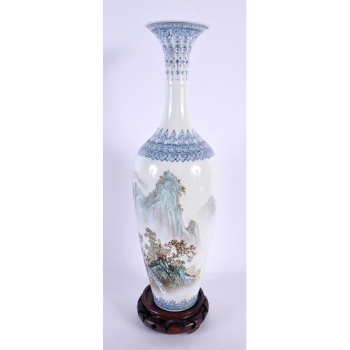 2211 - A BOXED CHINESE REPUBLICAN PERIOD FAMILLE ROSE EGG SHELL PORCELAIN VASE painted with landscapes. 30 ... 