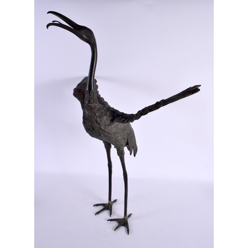 2212 - A LARGE 19TH CENTURY JAPANESE MEIJI PERIOD BRONZE OKIMONO modelled as a standing crane. 56 cm x 24 c... 