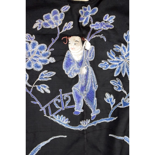 2213 - AN UNUSUAL LATE 19TH CENTURY CHINESE MIDNIGHT BLUE SILK EMBROIDERED ROBE Qing, decorated with figure... 