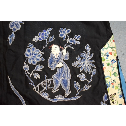 2213 - AN UNUSUAL LATE 19TH CENTURY CHINESE MIDNIGHT BLUE SILK EMBROIDERED ROBE Qing, decorated with figure... 