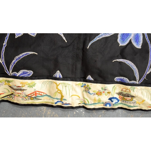 2213 - AN UNUSUAL LATE 19TH CENTURY CHINESE MIDNIGHT BLUE SILK EMBROIDERED ROBE Qing, decorated with figure... 