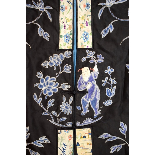 2213 - AN UNUSUAL LATE 19TH CENTURY CHINESE MIDNIGHT BLUE SILK EMBROIDERED ROBE Qing, decorated with figure... 