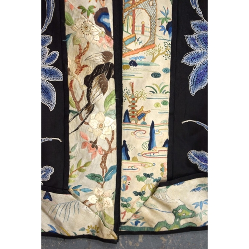 2213 - AN UNUSUAL LATE 19TH CENTURY CHINESE MIDNIGHT BLUE SILK EMBROIDERED ROBE Qing, decorated with figure... 