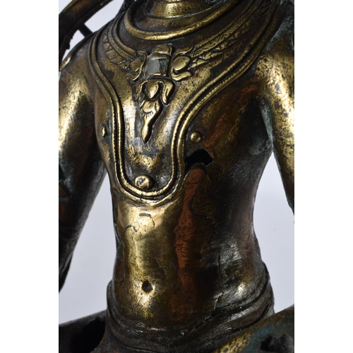 2215 - A LARGE 16TH/17TH CENTURY CHINESE BRONZE FIGURE OF A BUDDHA Ming/Qing, modelled upon a triangular ba... 