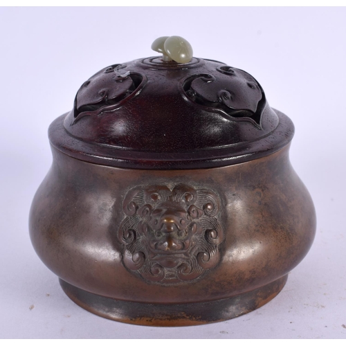 2217 - A CHINESE BRONZE CENSER AND COVER 20th Century, bearing Xuande marks to base, with jade finial. 12 c... 