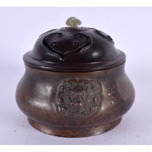 2217 - A CHINESE BRONZE CENSER AND COVER 20th Century, bearing Xuande marks to base, with jade finial. 12 c... 