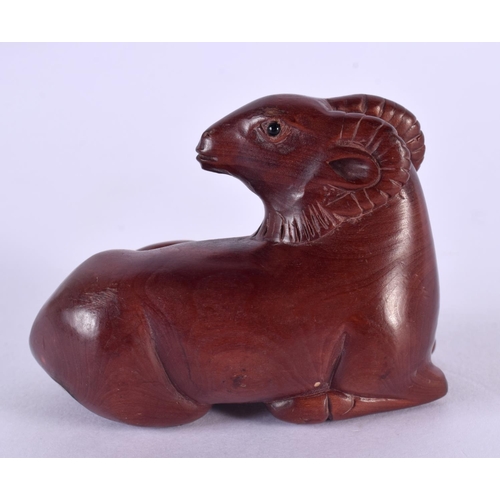 2239 - A JAPANESE CARVED BOXWOOD RAM NETSUKE. 7 cm x 5 cm.