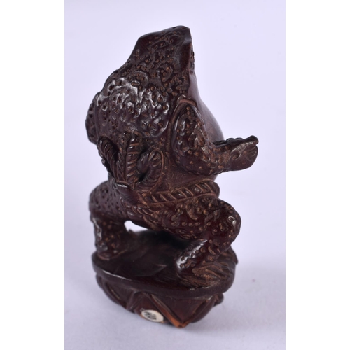 2247 - A JAPANESE CARVED BOXWOOD STANDING TOAD NETSUKE. 6 cm x 3 cm.