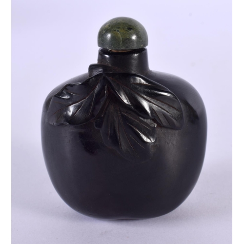 2255 - A 19TH CENTURY CHINESE CARVED HARDWOOD SNUFF BOTTLE Qing, carved with landscapes. 6 cm x 5 cm.